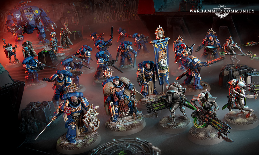 Claim your commemorative Space Marine 2 desk pad at your local Warhammer store